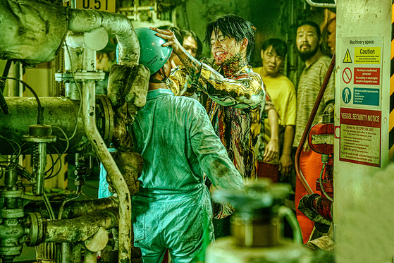 Actor Seo In-guk, right, during a scene in the new action horror film ″Project Wolf Hunting″ [CONTENTS ON]