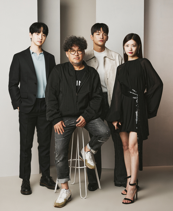 From left, actor Jang Dong-yoon, director Kim Hong-sun and actors Seo In-guk and Jeong So-min of the new action horror movie "Project Wolf Hunting" [CONTENTS ON]