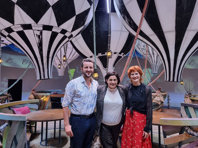 From left, Robert Keates, Suz Mountfort and Lauren Partridge pose for photos at a set for "The Grand Expedition" at Blue Square, in Yongsan-gu, Seoul. (Imculture, New Contents Company)