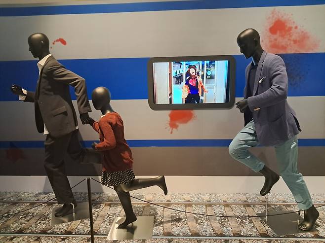 Costumes worn by the actors in "Train to Busan" are on display at "“All of Us are (Not) Zombies: 21st Century K-Zombie Chronicle." (Lee Si-jin/The Korea Herald)