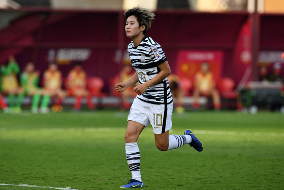 Ji So-yun runs after scoring a goal from a penalty shot against China during the Asian Football Confederation Women's Asian Cup India final match between China and Korea in Navi Mumbai on Feb. 6. [AFP/YONHAP]