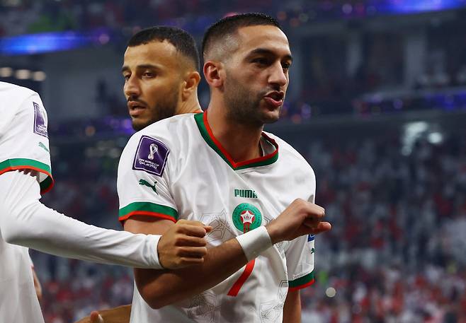 Soccer Football - FIFA World Cup Qatar 2022 - Group F - Canada v Morocco - Al Thumama Stadium, Doha, Qatar - December 1, 2022 Morocco's Hakim Ziyech celebrates scoring their first goal REUTERS/Ibraheem Al Omari