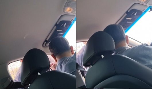 A씨가 운전을 똑바로 하지 않았다며 택시를 강제로 세우고 기사에게 폭언하는 상황. 뒷좌석에 타고 있던 B씨가 당시 모습을 촬영했다. [사진출처=온라인 커뮤니티 캡처]