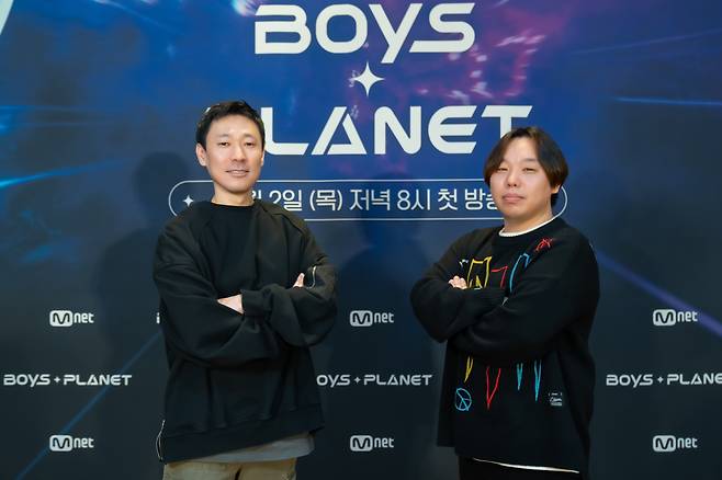 (From left) Mnet's producer Kim Shin-hyung and Ko Jeong-kyung pose for picture during "Boys Planet" production presentation event held in Seoul on Thursday. (CJ ENM)