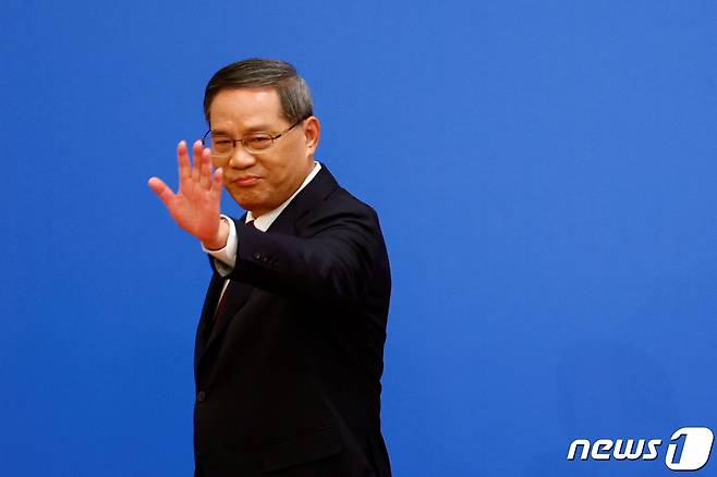 리창 신임 중국 국무원 총리가 13일(현지시간) 베이징 인민대회당에서 열린 기자회견에 참석하고 있다. ⓒ 로이터=뉴스1 ⓒ News1 정윤영 기자