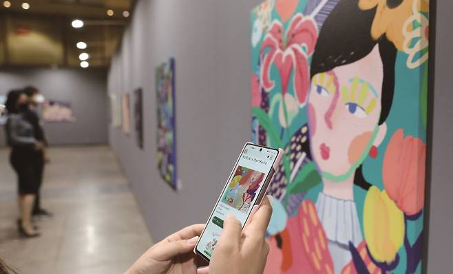 지난해 부산에서 열렸던 '블록체인 위크 인 부산 2022' 전시장 내 NFT 작품 특별전.[사진=뉴시스]