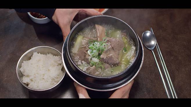 A Netflix screenshot shows a hot beef short rib soup, known as galbitang in Korean, in "A Nation of Broth" (Netflix, ELTV)
