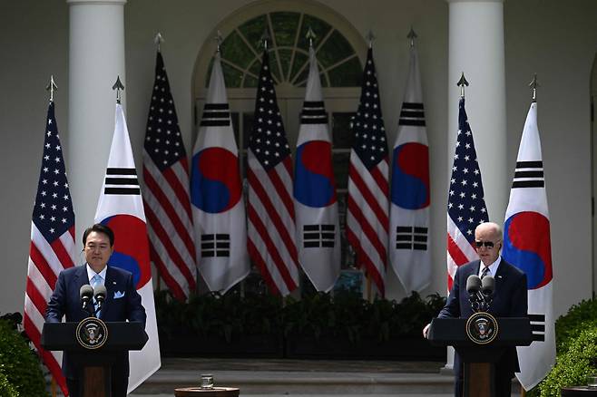 US President Joe Biden and South Korean President Yoon Suk Yeol participate in a news conference in the Rose Garden of the White House in Washington on Wednesday. (AFP)