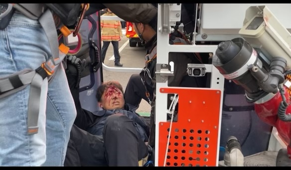 김준영 한국노총 금속노련 사무처장이 5월31일 경찰 곤봉에 머리를 맞아 피를 흘리는 모습 ⓒ 한국노총 금속노련 제공
