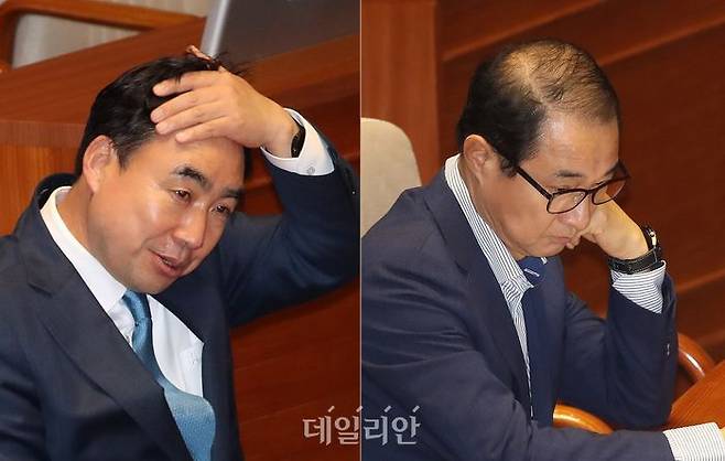 무소속 윤관석(왼쪽), 이성만 의원(오른쪽)이 30일 오후 국회에서 열린 본회의에 출석해 각각 자리하고 있다. 이날 본회의에서는 전당대회 돈 봉투 의혹으로 검찰 수사를 받고 있는 윤관석, 이성만 의원 체포동의안이 보고됐다. ⓒ데일리안 박항구 기자
