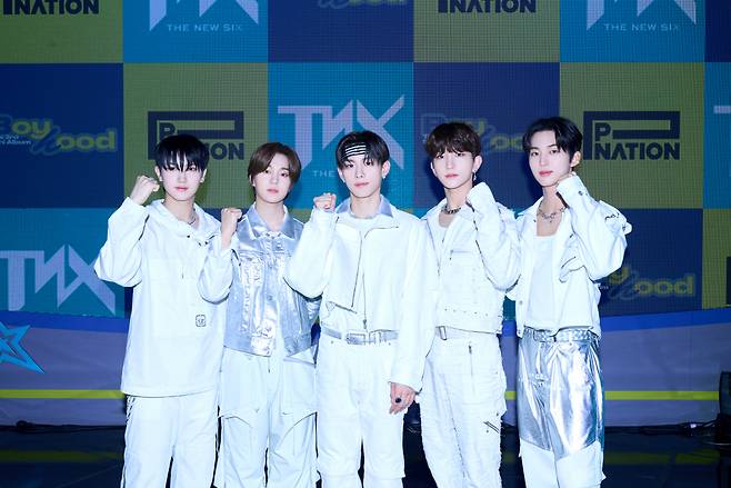 The New Six members pose for a picture at their press conference for their third EP, "Boyhood," held in Seoul on Wednesday. (P Nation)