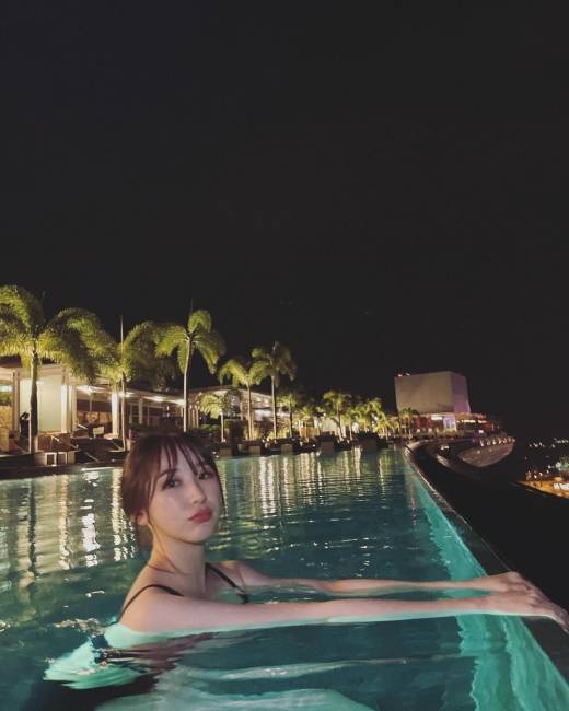 Singer Lee Chae-yeon recalled her summer vacation last year.Lee Chae-yeon wrote on July 17, The real summer is approaching. Singapores night was beautiful. Lee Chae-yeon, who enjoys leisure time in a hotel pool overlooking the city center, was included in the photo.Lee Chae-yeons beauty, as beautiful as Singapores night, attracts attention.Meanwhile, Lee Chae-yeon released her second mini album Over The Moon in April.