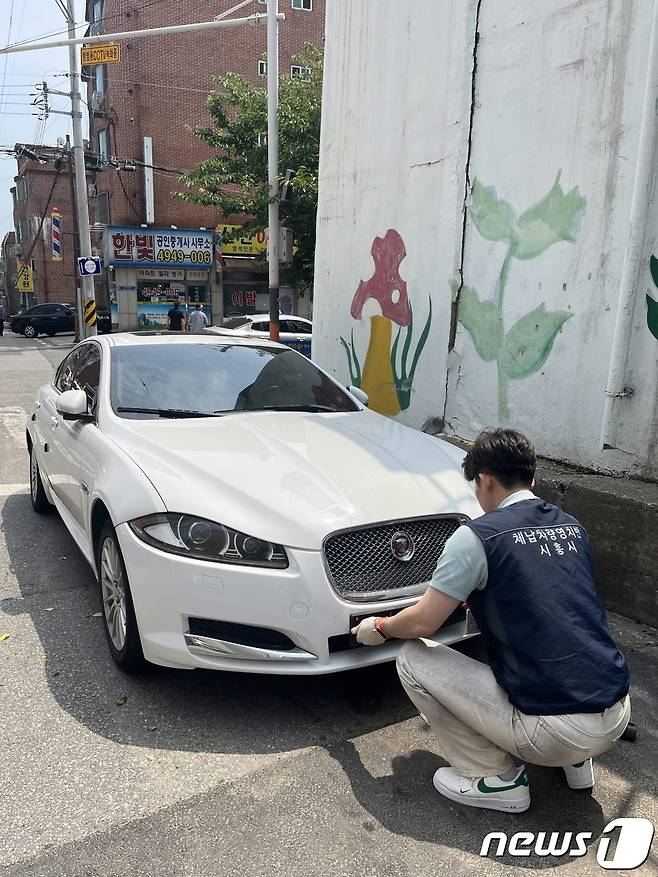 번호판 영치.(시흥시 제공)