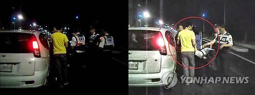 2009년 6월27일 박씨의 공무집행방해 혐의 현장이 담긴 영상. 오른쪽 영상은 왼쪽 영상의 화질을 개선한 것이다. 빨간 원이 범행 당시 경찰관 팔이 꺾이는 모습.(사진=변호인 측 제공)