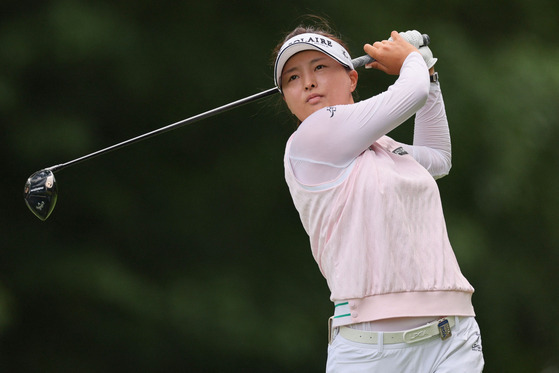 Ko Jin-young hits a tee shot on the fourth hole during the third round of the KPMG Women's PGA Championship at Baltusrol Golf Club on June 24 in Springfield, New Jersey. [AFP/YONHAP]