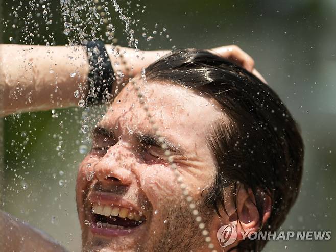 북반구에 일찍 닥친 폭염 [AP 연합뉴스 자료사진. 재판매 및 DB 금지]