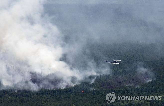 캐나다 퀘벡주 산불 현장 [AP/캐나다프레스 연합뉴스 자료사진]