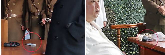 폴더블 폰으로 바꾼 김정은 김정은 북한 국무위원장이 지난 12일 신형 고체연료 대륙간탄도미사일(ICBM) 화성-18형 시험발사를 지도한 현장의 책상 위에 폴더블 스마트폰으로 추정되는 물체가 놓여 있다(오른쪽 사진). 왼쪽 사진은 김 위원장이 지난 3월9일 화성포병부대 화력습격훈련을 현지지도한 현장에서 포착된 흰색 일체형 스마트폰. 조선중앙통신연합뉴스