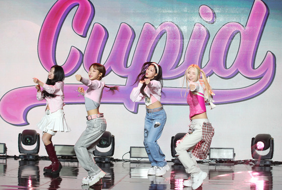 Girl group Fifty Fifty performs its megahit "Cupid" during a press conference in April 2023. [NEWS1]