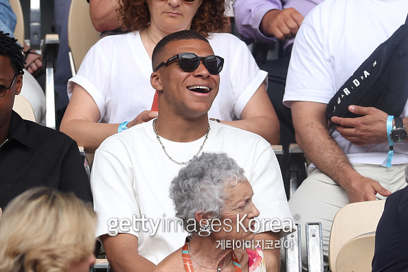PARIS, FRANCE - JUNE 11: Footballer Kylian Mbappe is seen attending the Men's Singles Final match between Novak Djokovic of Serbia and Casper Ruud of Norway on Day Fifteen of the 2023 French Open at Roland Garros on June 11, 2023 in Paris, France. (Photo by Julian Finney/Getty Images)