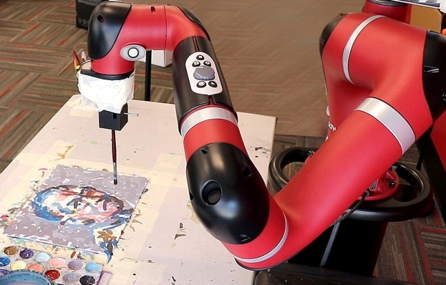 AI를 탑재해 마치 사람처럼 생각하고 한 획 한 획 그림을 그려내는 로봇 ‘프리다’가 그림을 그리는 모습. 오혜진 카네기멜런대 로보틱스학과 교수팀이 개발에 성공했다. <CMU제공>