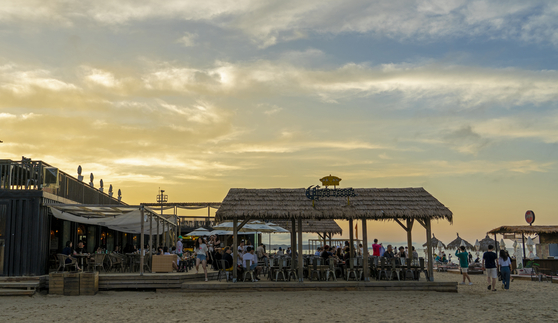 Yangyang Surfyy Beach is known for its water activities and nightlife. [BAEK JONG-HYUN]