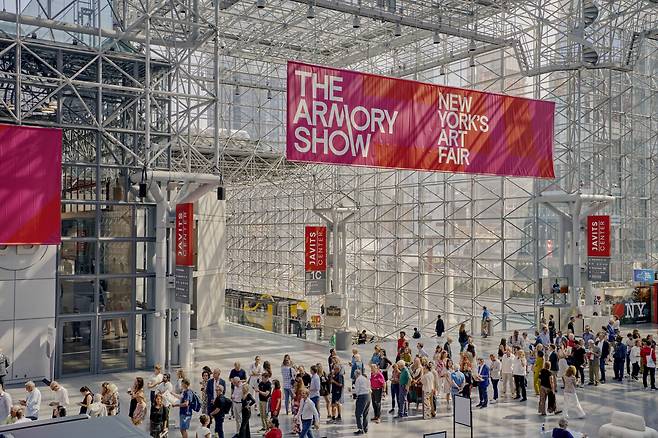 People stand in line to enter The Armory Show at the Javits Center in New York on Thursday. (Vincent Tullo, The Armory Show)