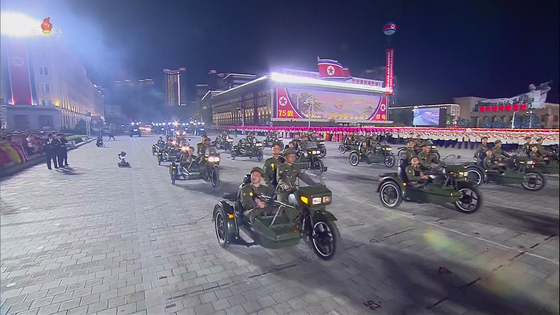 The motorcycle troup of the Worker-Peasan Red Guards during Saturday's parade at Kim Il Sung Square. [KOREAN CENTRAL NEWS AGENCY]