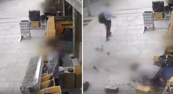 지난 19일 오후 2시쯤 서울 종로구 세운상가에서 83㎏ 가량의 외벽이 상인 발등 위로 떨어졌다./JTBC 보도화면 캡처