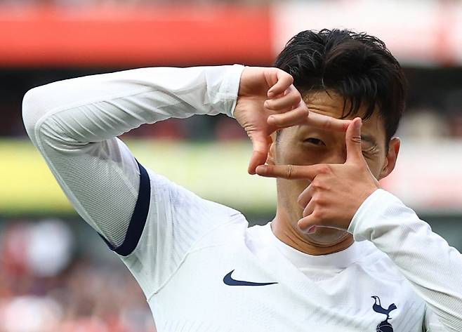 Soccer Football - Premier League - Arsenal v Tottenham Hotspur - Emirates Stadium, London, Britain - September 24, 2023 Tottenham Hotspur's Son Heung-min celebrates scoring their second goal Action Images via Reuters/Matthew Childs NO USE WITH UNAUTHORIZED AUDIO, VIDEO, DATA, FIXTURE LISTS, CLUB/LEAGUE LOGOS OR 'LIVE' SERVICES. ONLINE IN-MATCH USE LIMITED TO 45 IMAGES, NO VIDEO EMULATION. NO USE IN BETTING, GAMES OR SINGLE CLUB/LEAGUE/PLAYER PUBLICATIONS.