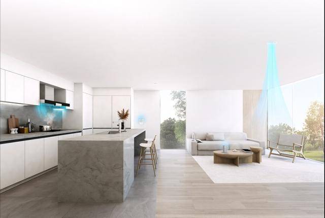 나비엔 청정환기시스템 키친플러스의 작동 예시 이미지. 3D에어후드(왼쪽)가 공기로 커튼을 내려주고, 청정환기시스템(오른쪽)은 청정 공기를 공급해 매연이 후드로 흡수되도록 돕는다. 경동나비엔 제공