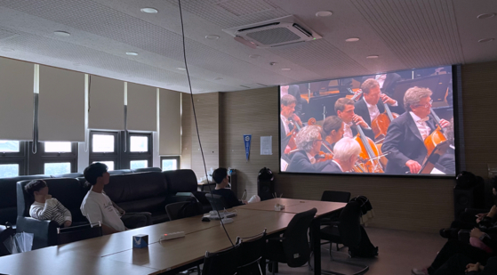 Members of Yonsei University's classical music society, Harmony, listen to classical music together. [NASIM RAGUS]