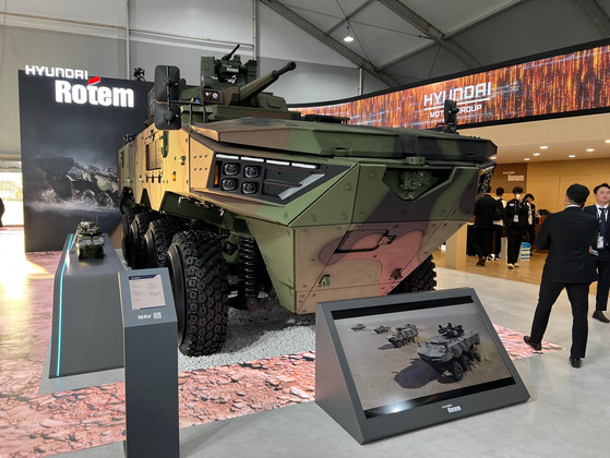 A full-scale model of Hyundai Rotem's wheeled armored vehicle under development is on display at the company's exhibit at the Seoul ADEX on Tuesday. [MICHAEL LEE]