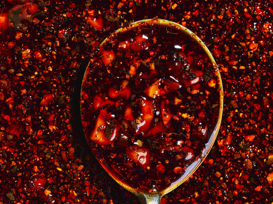 Chili crisp is an ancient Chinese condiment that consists of fried chili flakes with other pungent ingredients and spicy oil. [JAMES PARK]