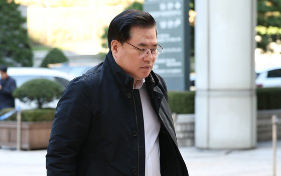 유동규 전 성남도시개발공사 본부장이 13일 서초구 서울중앙지방법원에서 열린 대장동 개발 사업 로비·특혜 의혹 관련 1심 속행 공판에 출석하고 있다. 뉴스1