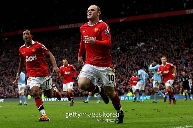 지난 2011년 맨체스터 유나이티드 웨인 루니가 맨체스터 시티전에서 골을 넣은 뒤 기뻐하고 있다. 사진=게티이미지