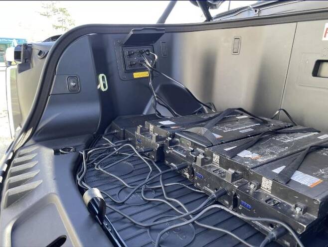 포드 'F-150 라이트닝'으로 충전하는 전동스쿠터 배터리 [포드 홈페이지 캡처. 재판매 및 DB 금지]