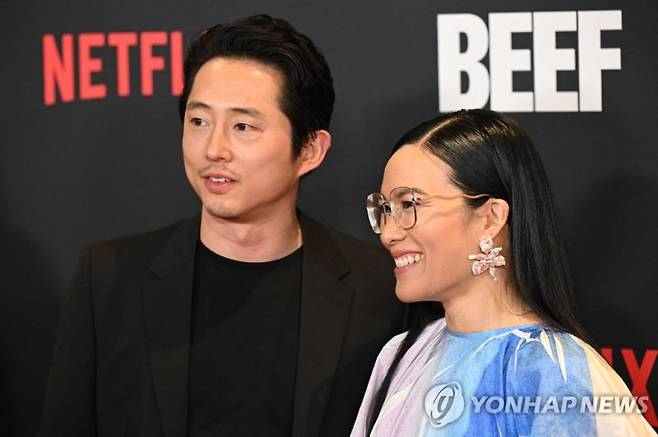 (FILES) Actors and executive producers Steven Yeun and Ali Wong arrive for the Los Angeles premiere of Netflix's Beef at the Tudum Screening Room in Los Angeles, California, on March 30, 2023. Can any TV show topple "Succession" at the Emmys? Will Amazon's lavish "Lord of the Rings" rule them all? And, with ongoing Hollywood strikes, will television's finest even be honored this year? Nominations for television's equivalent of the Oscars will be announced in a live-streamed ceremony Wednesday July 12, starting at 8:30 am Pacific time (1530 GMT), after which final-round voting begins for the 75th Emmy Awards, tentatively set for September 18. (Photo by Robyn BECK / AFP)