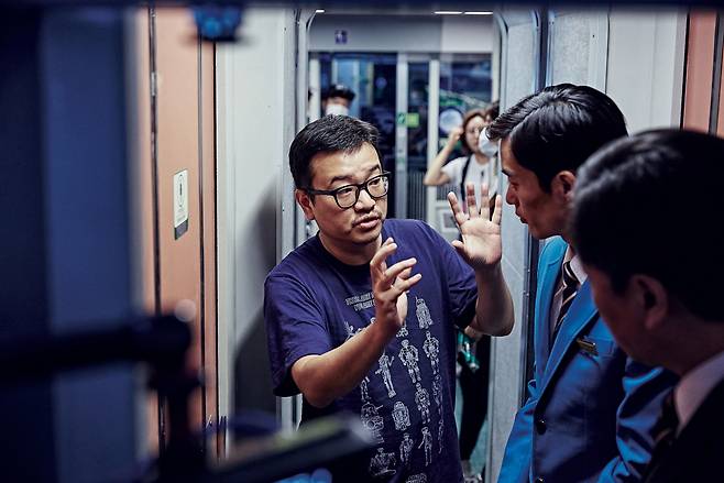 Director Yeon Sang-ho is seen on the set of "Train to Busan." (Next Entertainment World)
