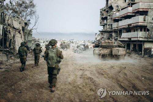 가자지구서 작전 중인 이스라엘 군인들 [AFP=연합뉴스 자료사진. 재판매 및 DB금지]