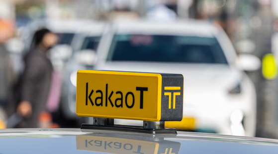 A Kakao T Blue taxi parked near Seoul station in February, 2023 [YONHAP]