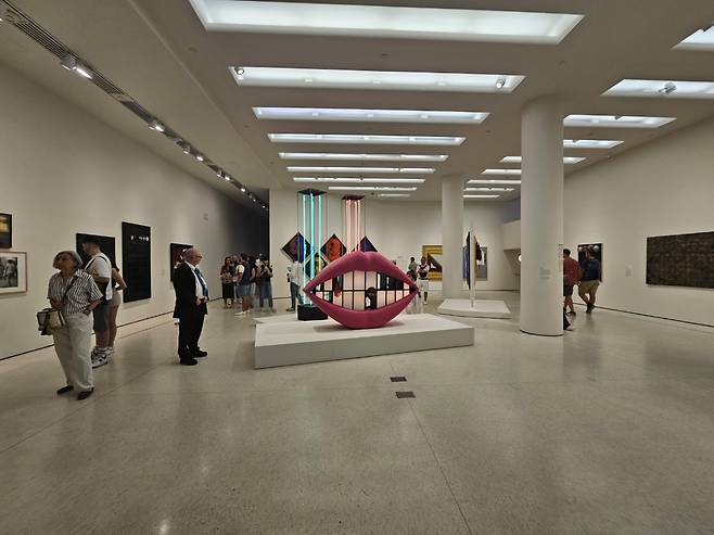 Visitors to the "Only the Young: Experimental Art in Korea, 1960s-1970s" at Guggenheim Museum view works on display on Sept.10, 2023. (Park Yuna/The Korea Herald)