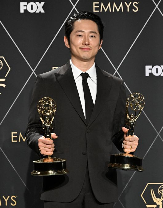 Steven Yeun poses in the press room with the Emmy for outstanding lead actor in a limited or anthology series or movie for BEEF at the 75th Emmy Awards on Monday, Jan. 15, 2024 at the Peacock Theater in Los Angeles. (Photo by Dan Steinberg/Invision for the Television Academy/AP Images)