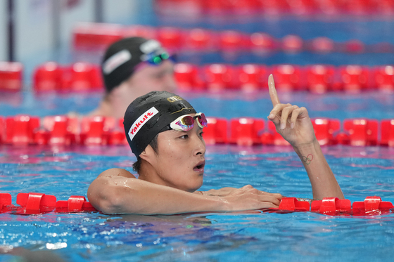 Kim Woo-min celebrates after the men's 400-meter freestyle final at the World Aquatics Championships 2024 in Doha, Qatar on Sunday. [XINHUA/YONHAP]