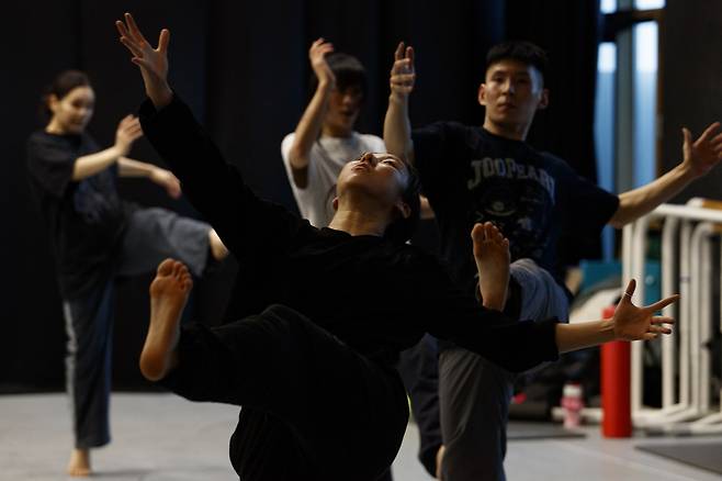 Dancers rehearse a scene from "Jungle." (KNCDC)