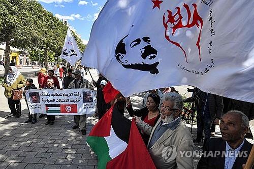 11년 전 암살된 튀니지 야권 지도자 초크리 벨라이드 지지자들 [AFP 연합뉴스 자료사진 재판매 및 DB 금지]