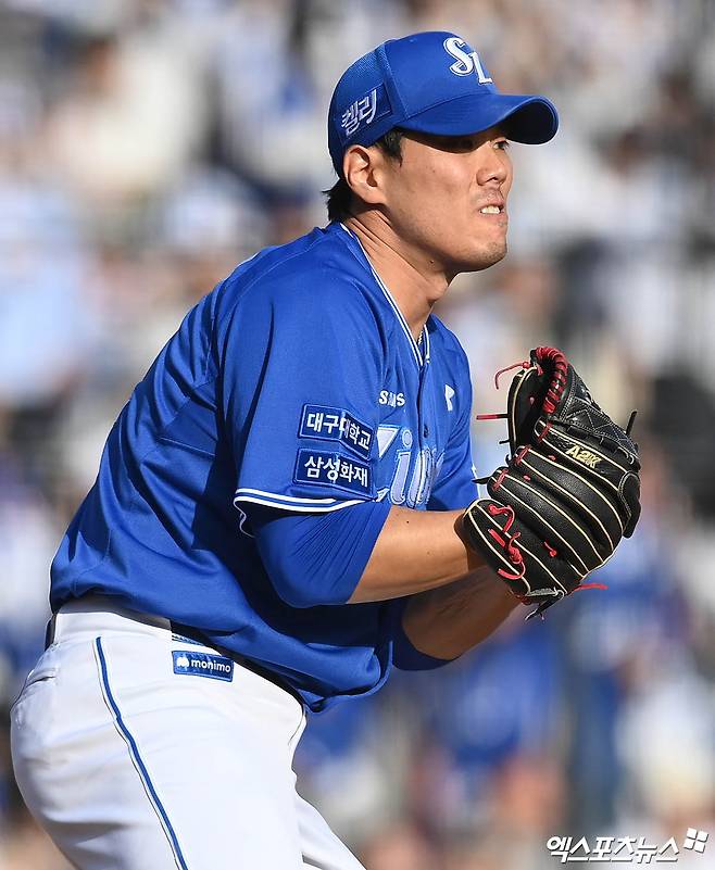 삼성 라이온즈 구원투수 김재윤이 타자를 아웃시킨 뒤 세리머니하고 있다. 엑스포츠뉴스 DB