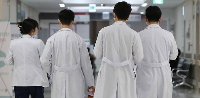 Medical staff walks at a university hospital in Seoul, South Korea. By Soobin Han