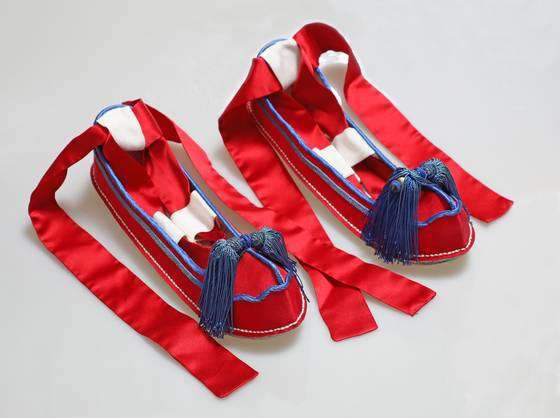 Reproductions of red traditional Korean shoes worn by the kings and crown princes of the Joseon Dynasty (1392-1910) [PARK SANG-MOON]