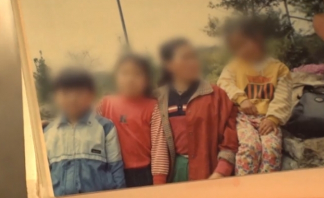 숨진 '무기수' 장모씨의 아내와 자녀들의 사진. SBS '그것이 알고 싶다' 캡처
